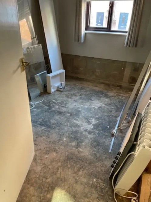 Room with damp and unfinished flooring in Fareham