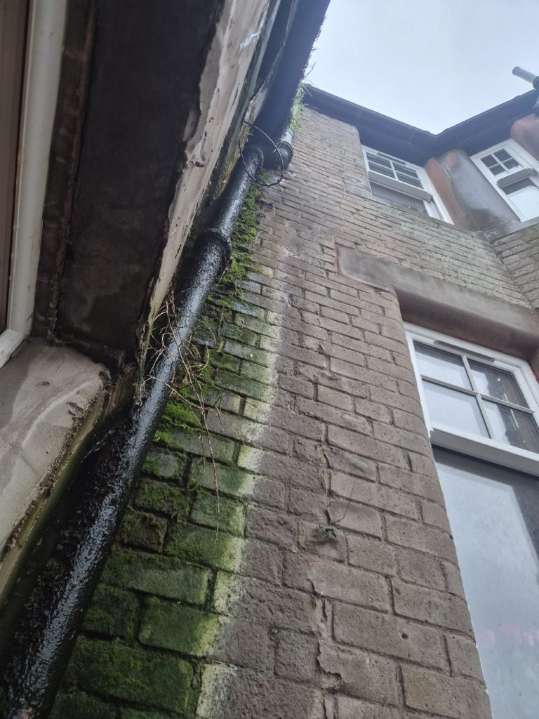 Penetrating damp on a building in Perth caused by broken gutter