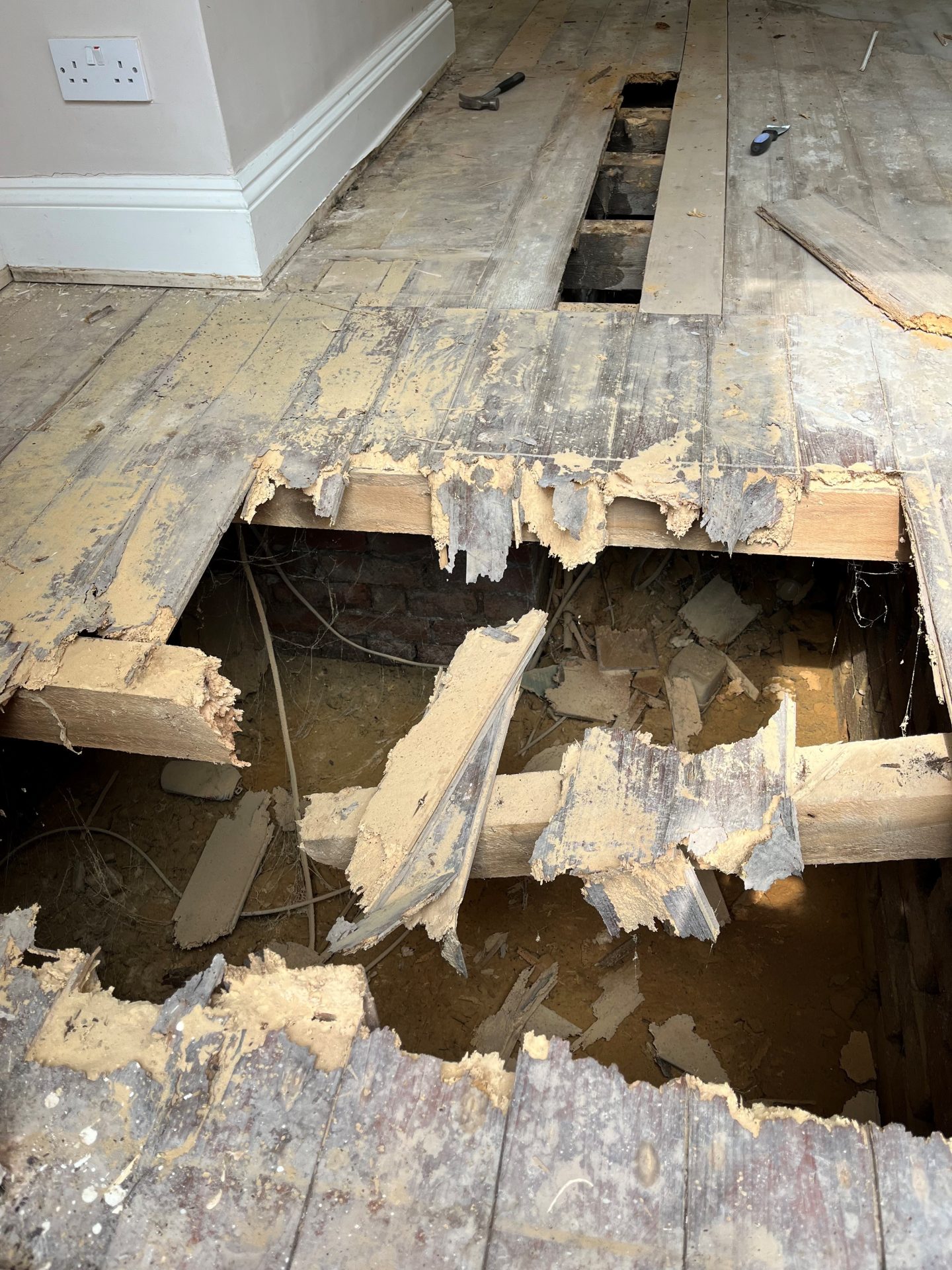 Top 5 Challenges UK Landlords and Property Managers will Face in 2026 5 Damaged floorboards as the result of a woodworm infestation