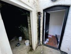 Damp staining around rear doorways