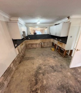 damp concrete floor in kitchen