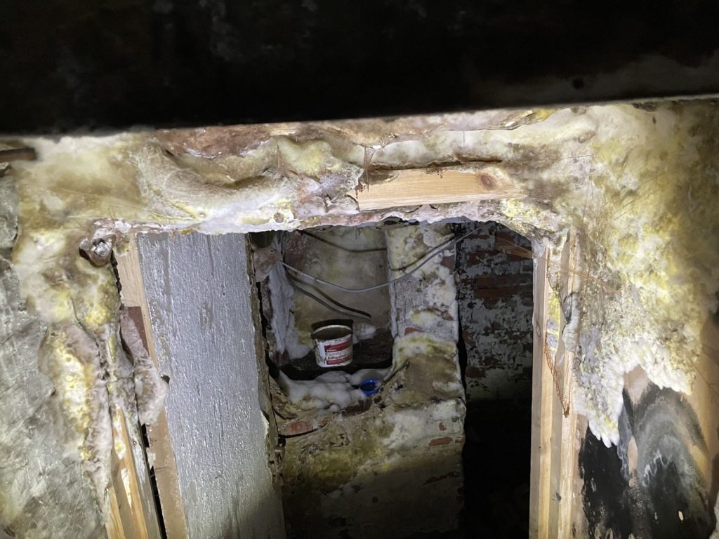 Severe damp and dry rot on a wall in Lincoln