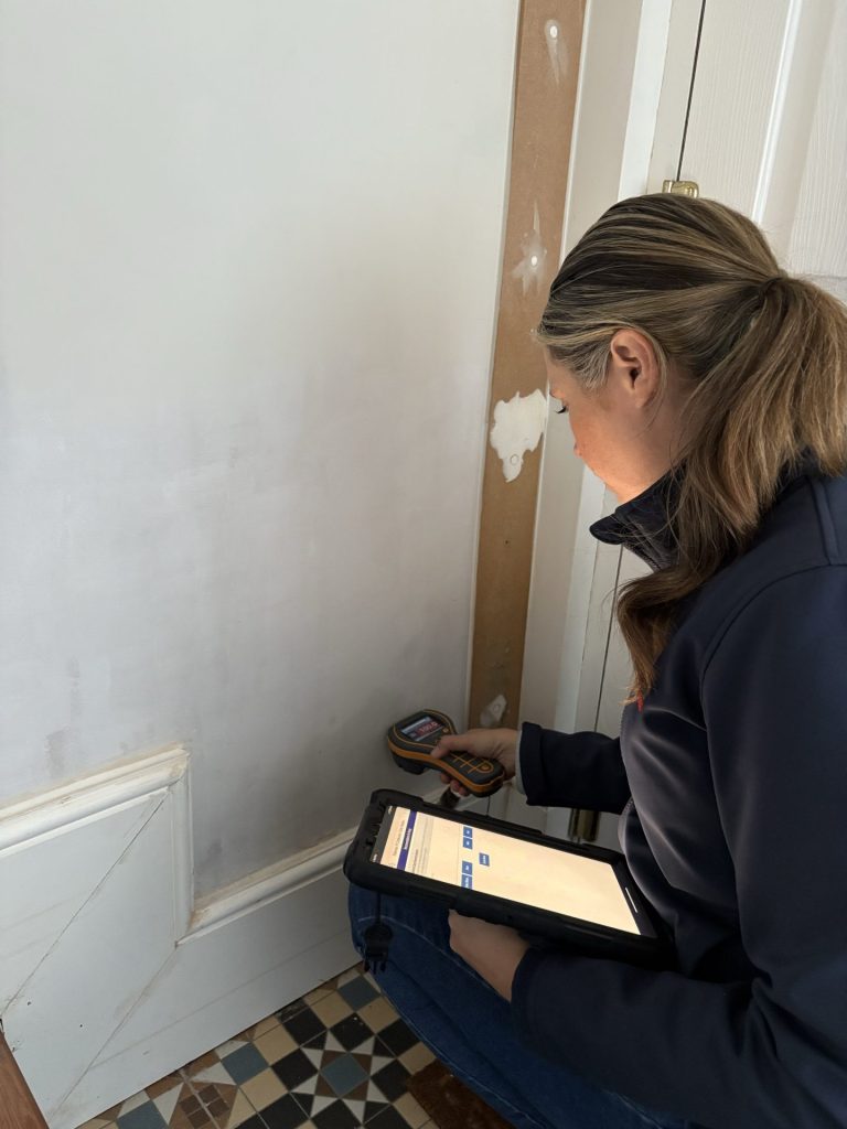 Timberwise Surveyor carrying out damp survey in bristol