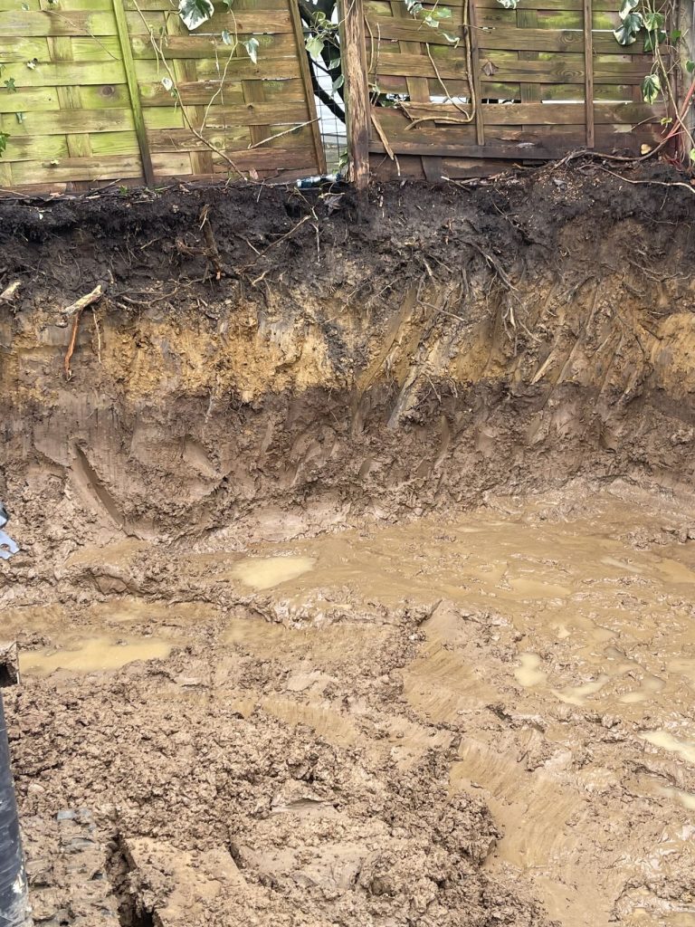 London Clay and Flooding: Structural Repair Risks Explained 34 Exposed soil profile outside a London property