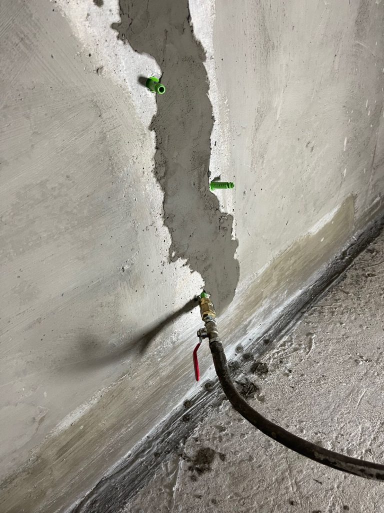 Commercial Concrete Damage in London: Causes, Risks & Repair Solutions 3 Resin repair on a concrete wall