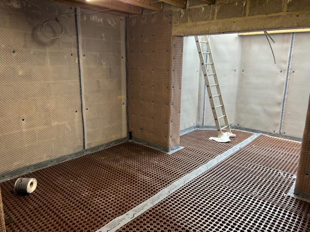 Interior space with membrane flooring installed.