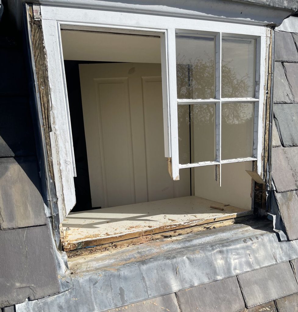 Timber windows in need of repair on a property in Lincoln