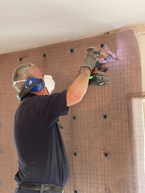 Why are Structural Defects Common in London Homes? 6 Timberwise technician installing waterproofing membrane Timberwise