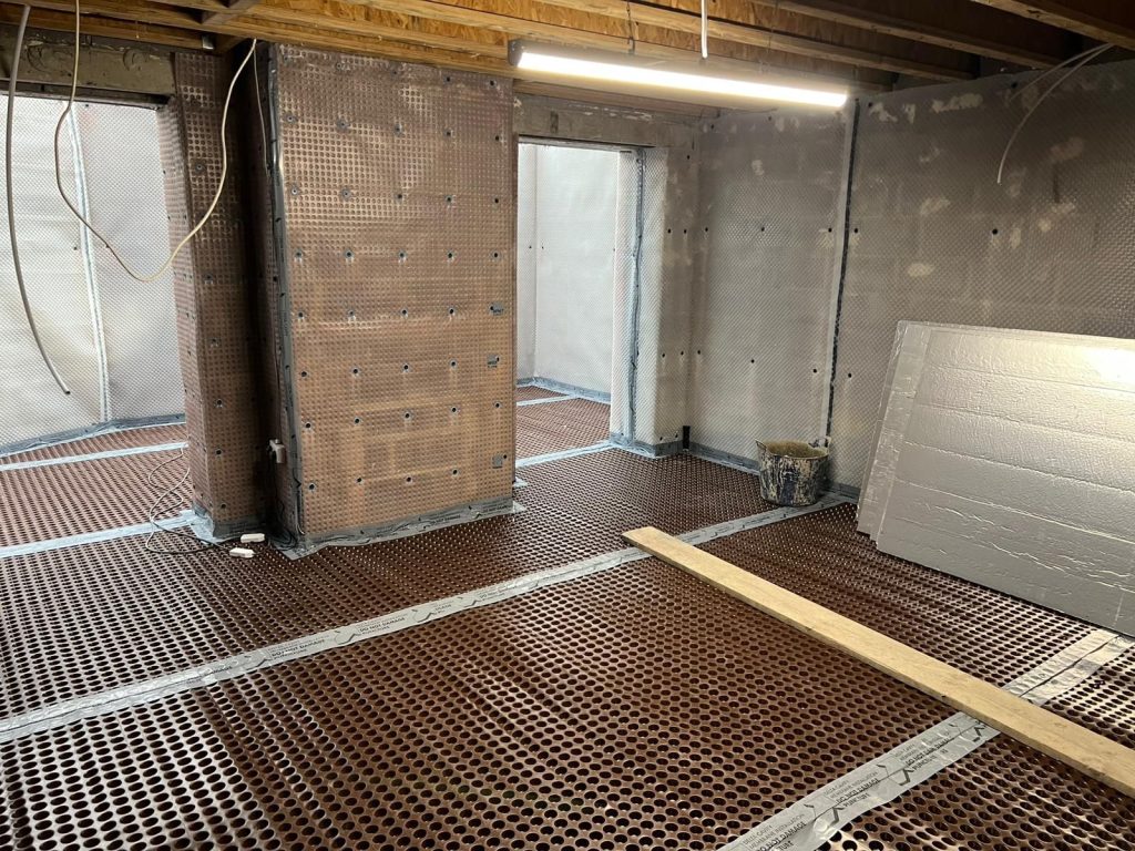 Delta membrane system being installed on a basement waterproofing project by Timberwise in Newcastle