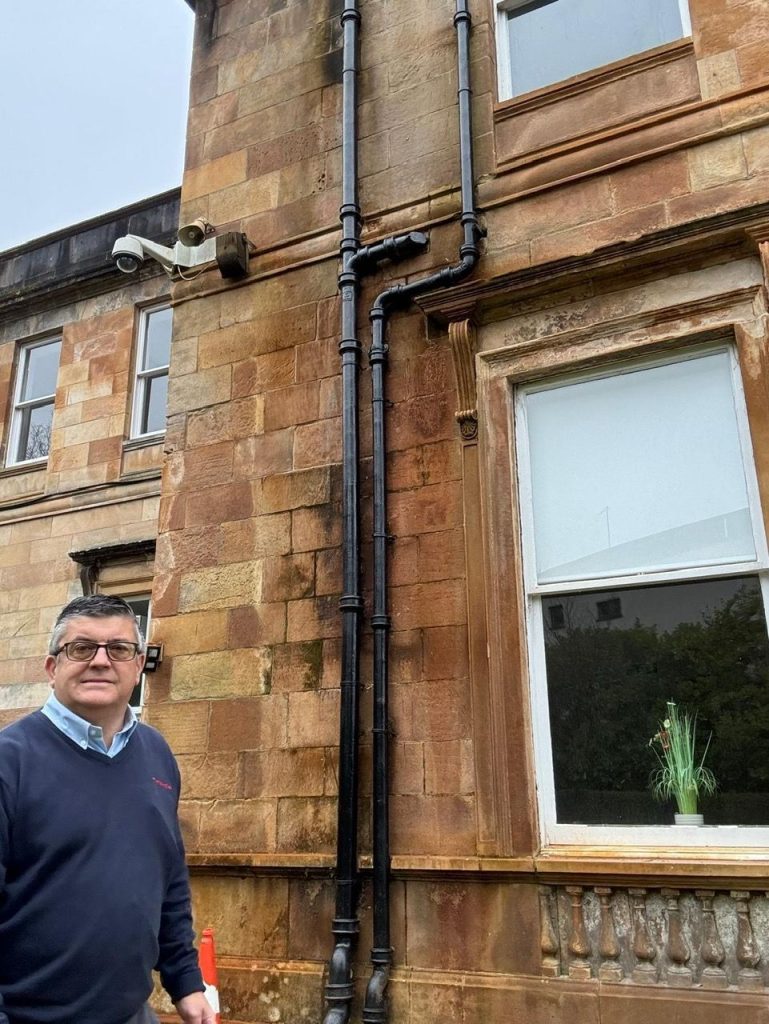Timberwise Surveyor inspecting Kilmardinny House's damp issues near Glasgow.