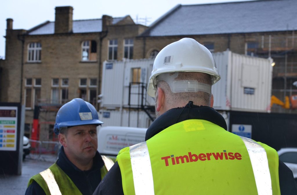 Creating a Positive Health & Safety Culture in High-Risk Property Environments 2 Two surveyors conducting a risk assessment outside a property