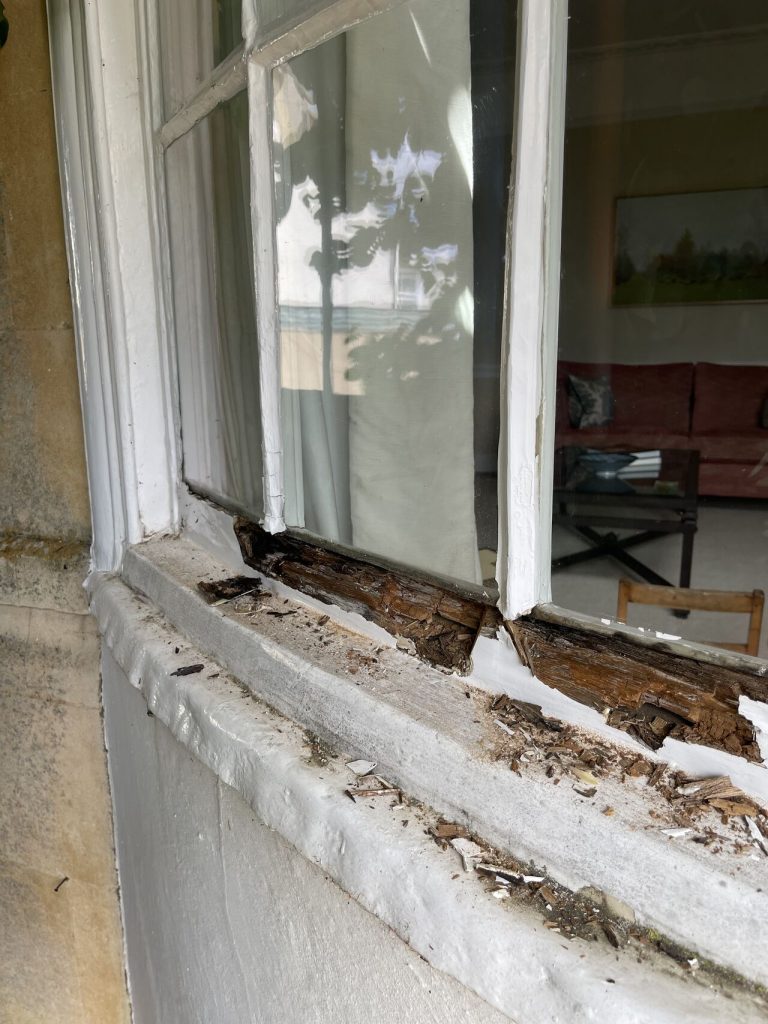 Is it Better to Repair or Replace My Timber Windows? 3 A timber window showing signs of decay